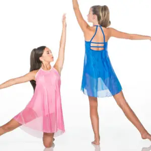 Two young dancers in flowing pink and blue dresses