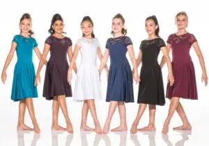 Six girls modeling lace-neck dresses in assorted colors