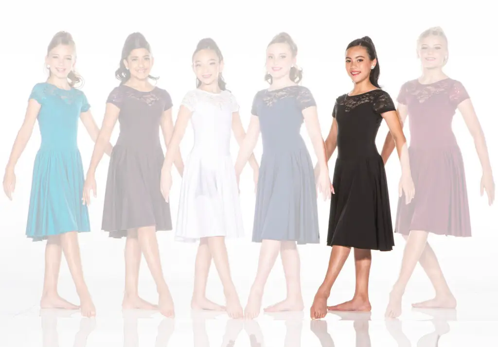 Six young women modeling lace dresses in various colors