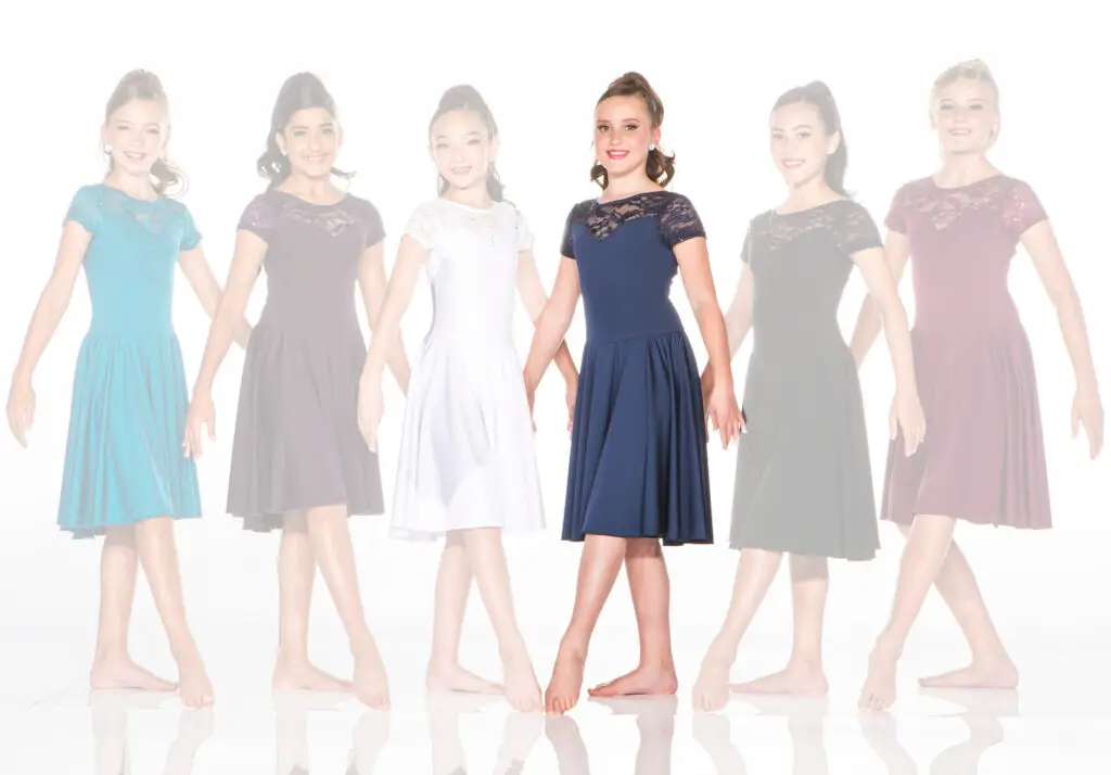 Six girls modeling lace-top dresses against a white background