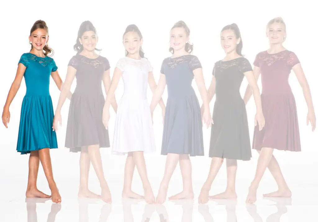 Six girls modeling lace-top dresses in various colors