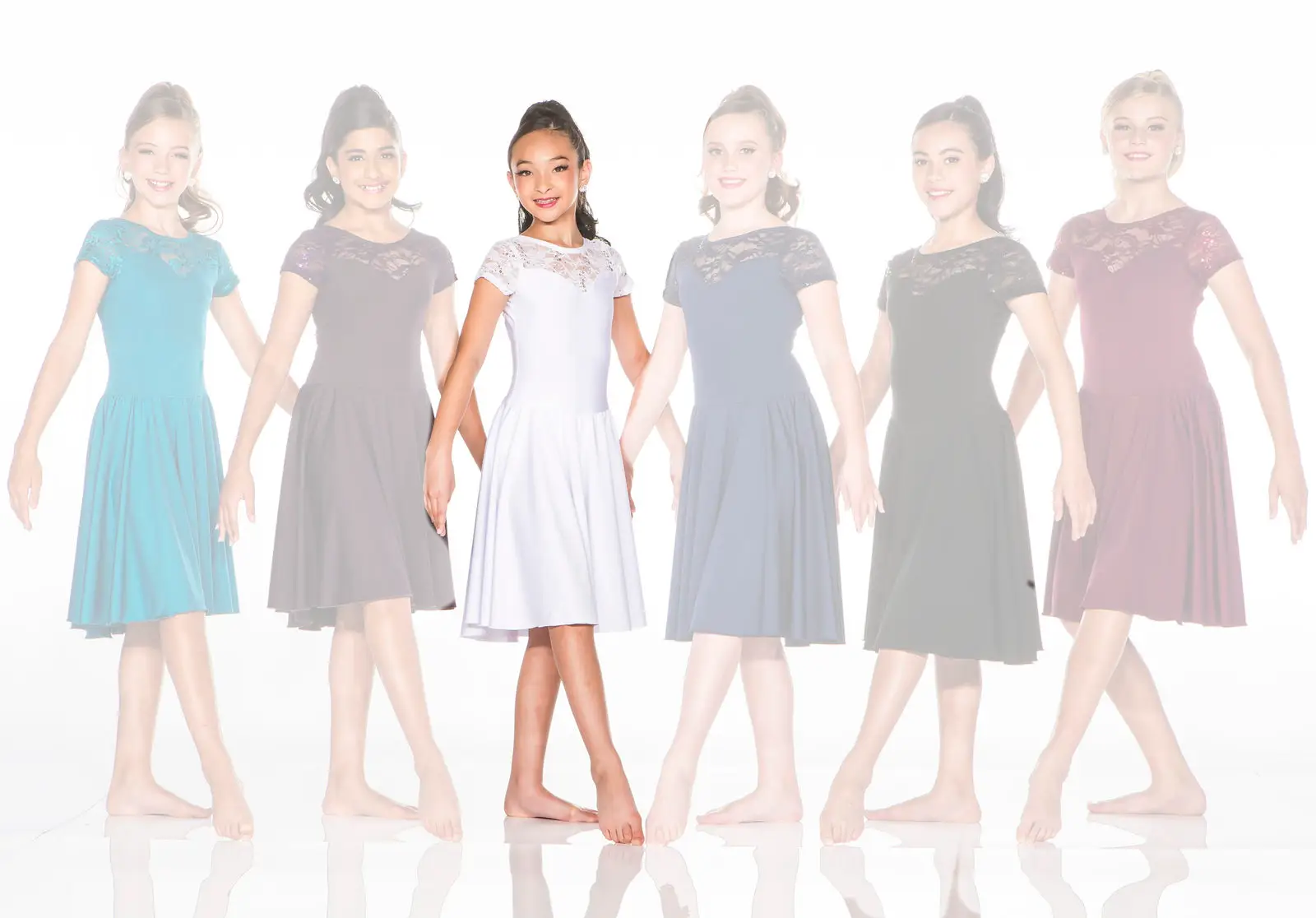 Six girls wearing lace dresses, central dancer highlighted