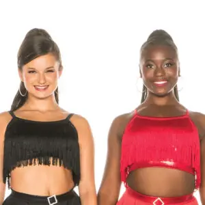 Two smiling dancers wearing black and red fringe costumes