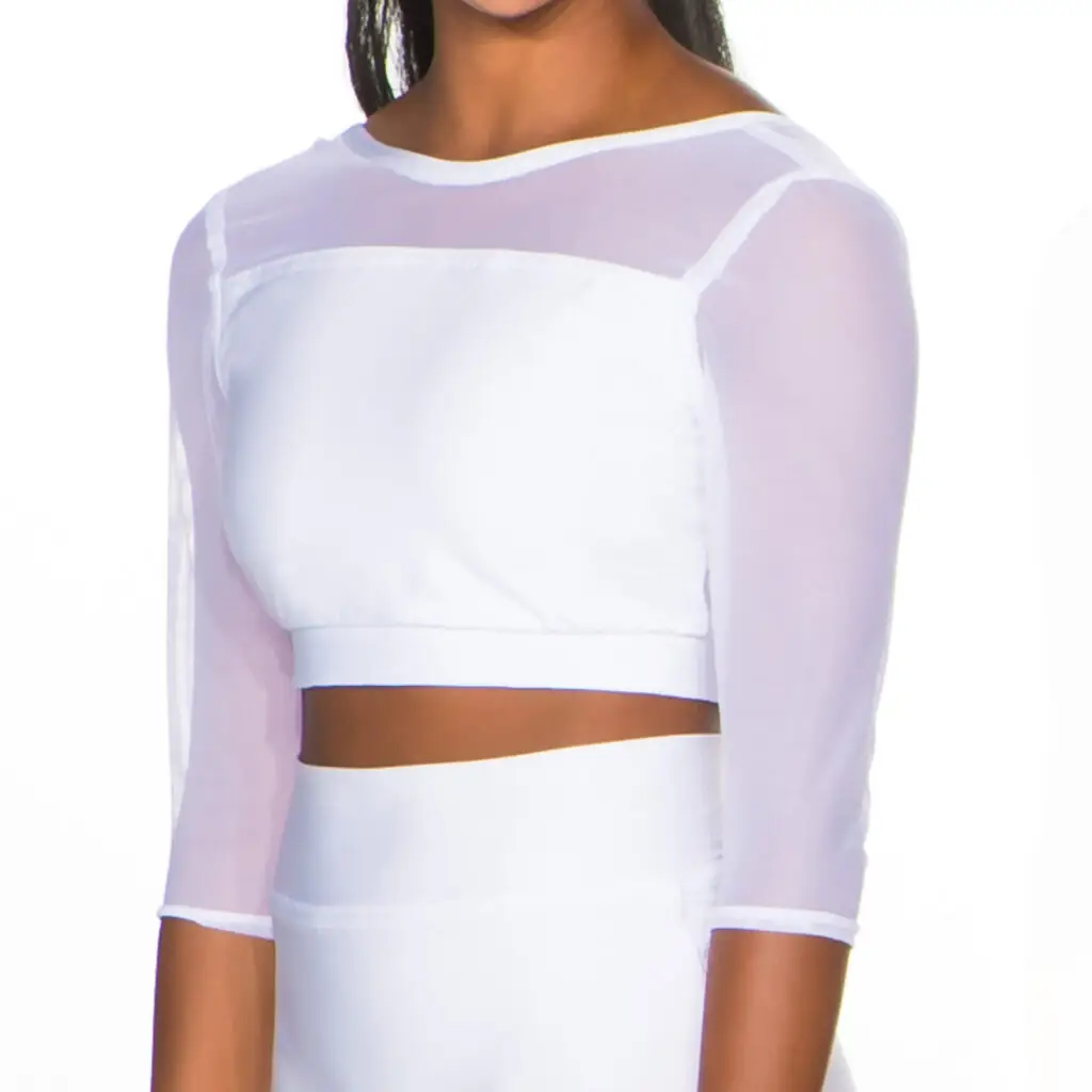 Woman wearing white mesh long-sleeve crop top