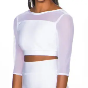 Woman wearing white mesh long-sleeve crop top