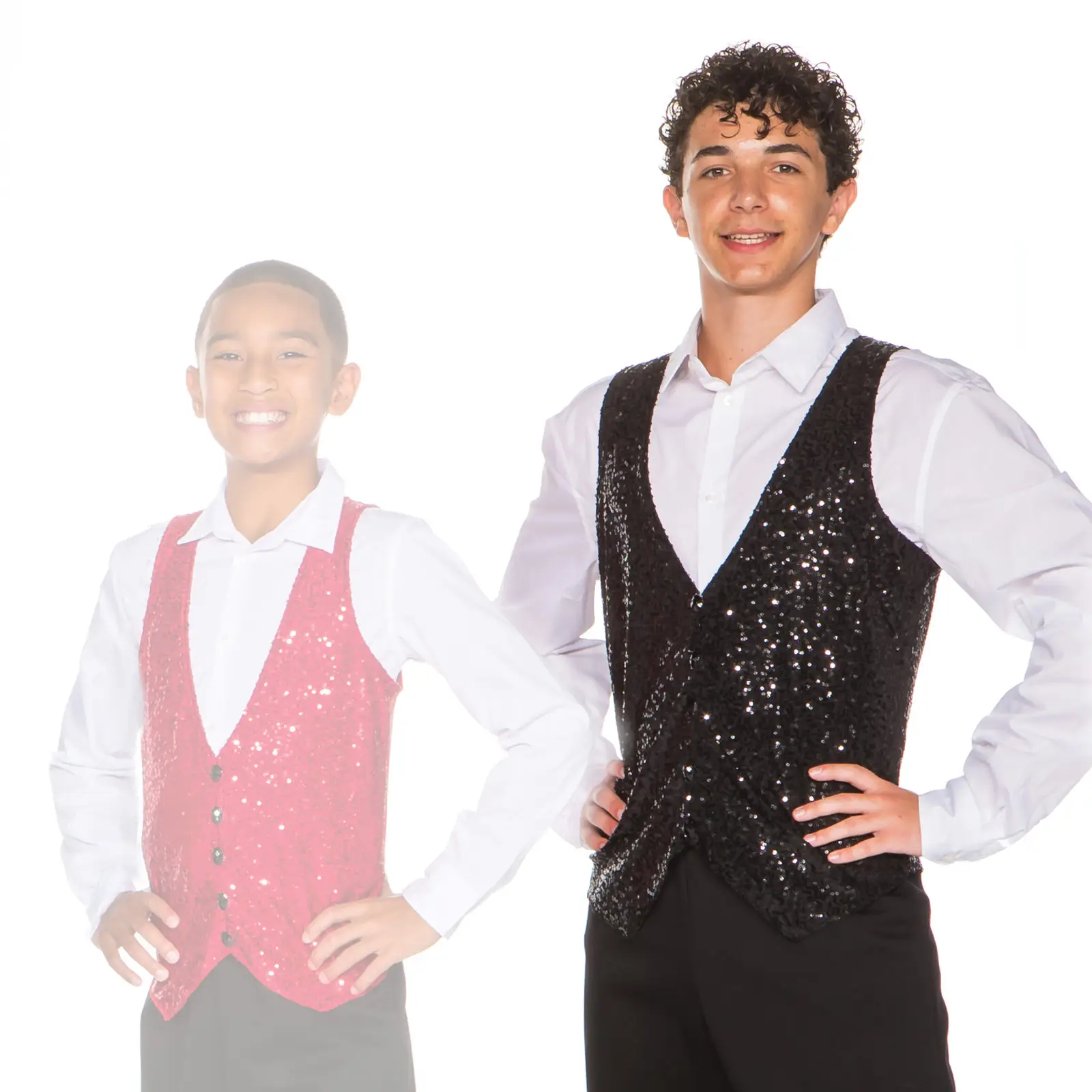 Two smiling boys wearing sequined vests against white background