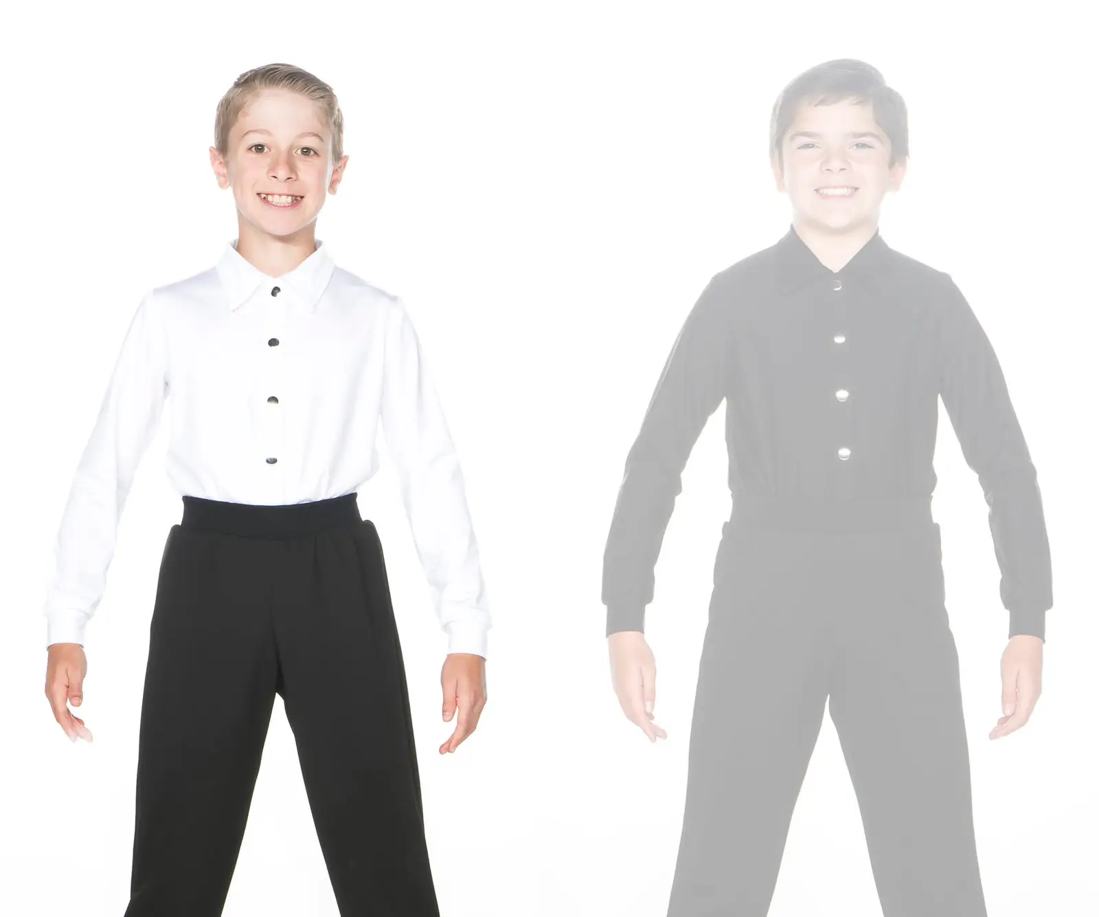 Two smiling boys wearing contrasting black-and-white outfits