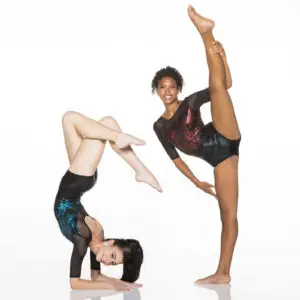 Two gymnasts performing flexibility poses on a white background.