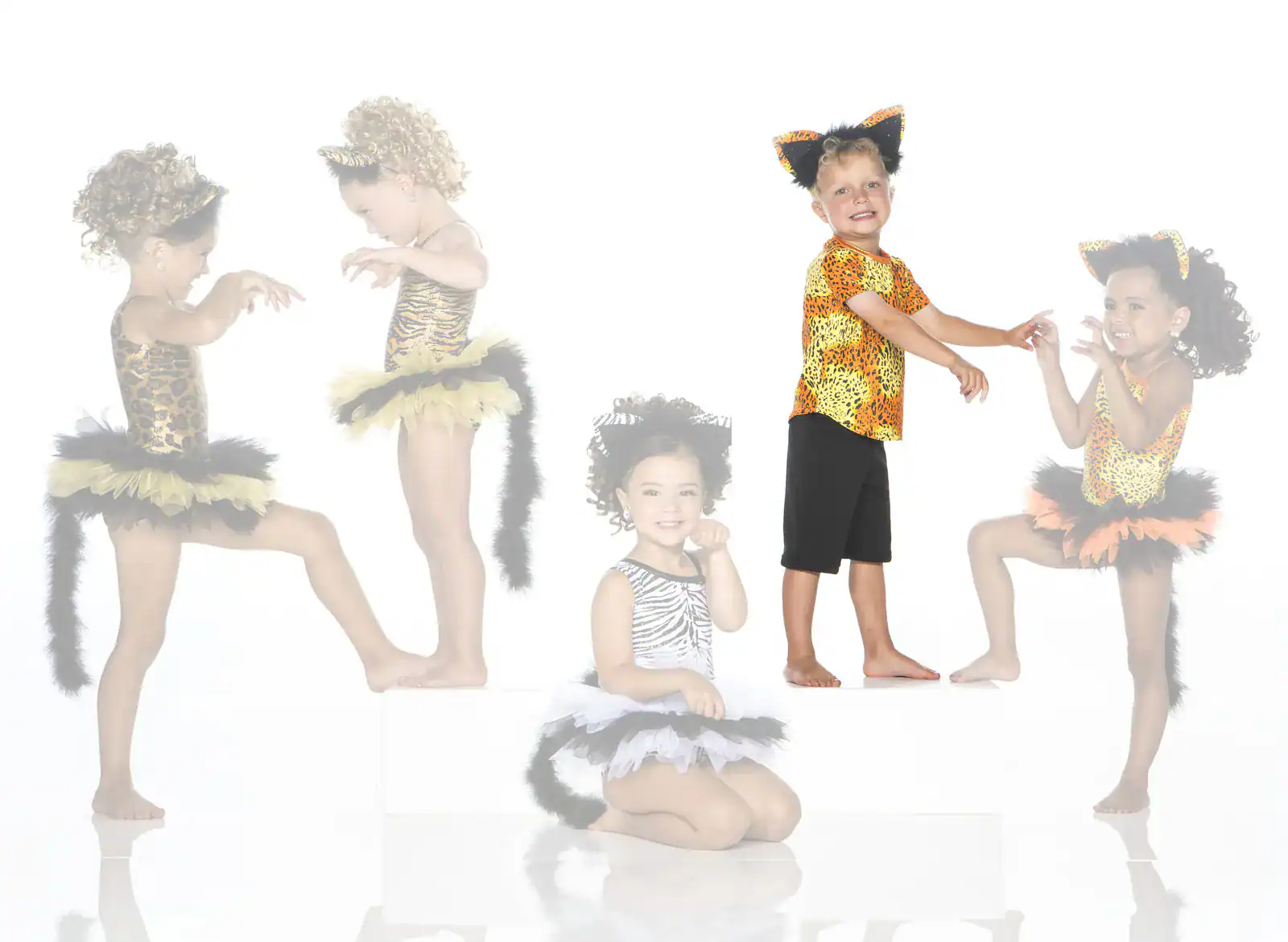 Five children wearing animal-themed costumes on white background