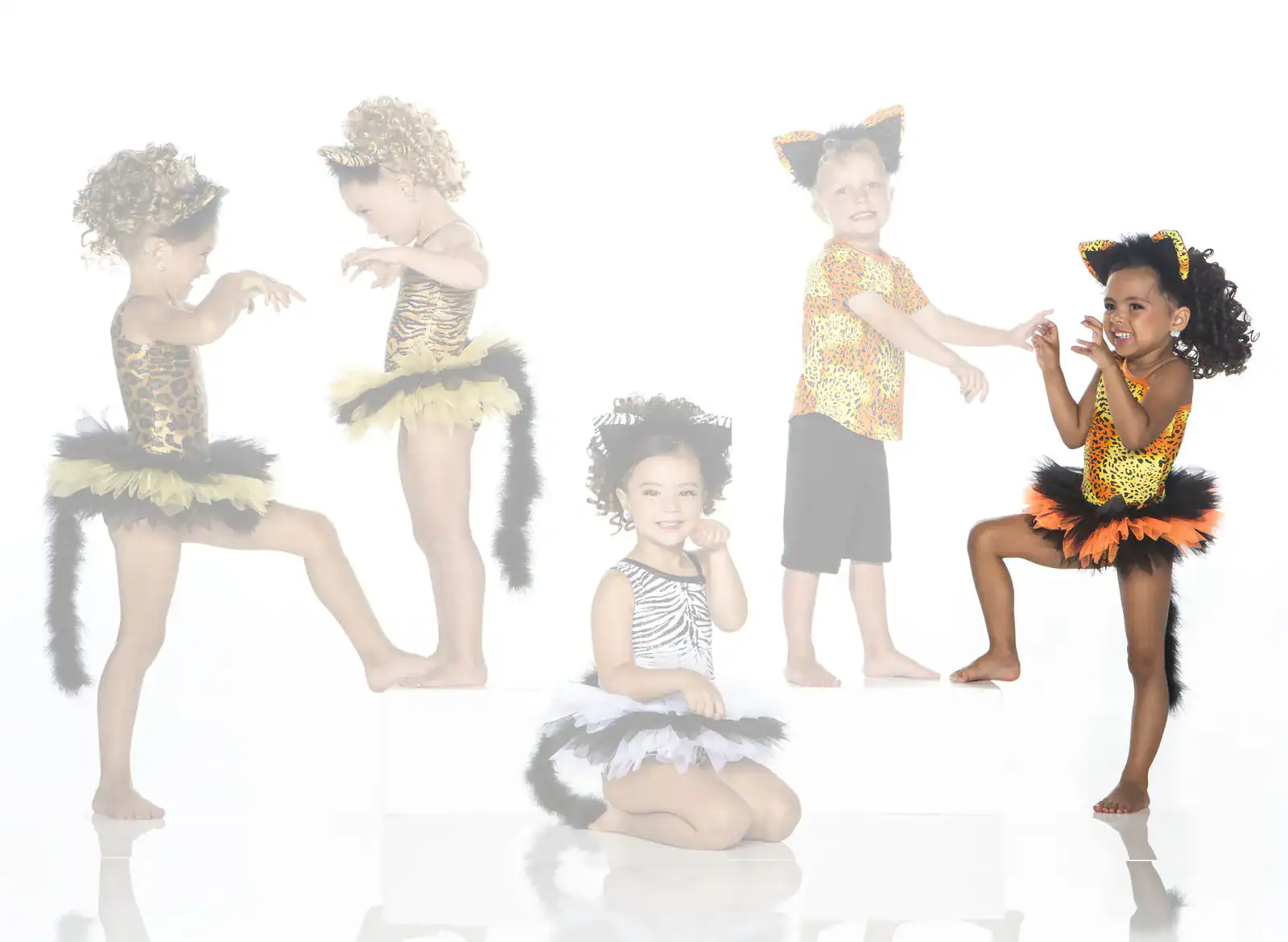 Five children wearing animal-themed costumes and posing playfully