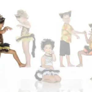 Five children in leopard and zebra animal costumes