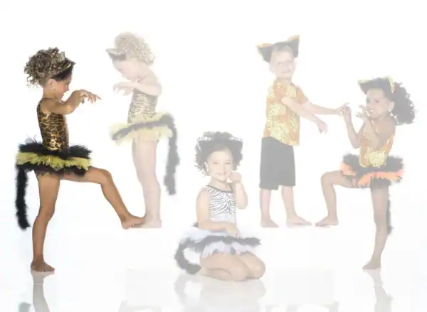 Five children in leopard and zebra animal costumes