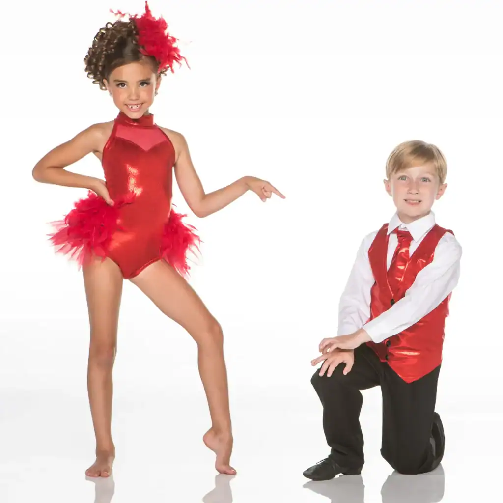 Young dancers posing in red costumes against white background