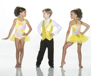 Children wearing colorful yellow and floral dance costumes
