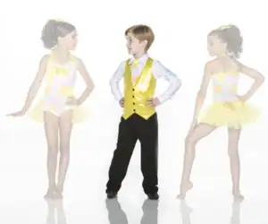 Three children wearing colorful yellow dance costumes pose together.