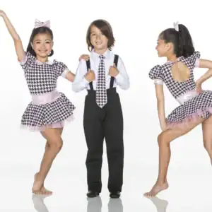 Three children modeling coordinated houndstooth dance costumes.