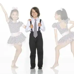Young dancers in matching houndstooth costumes posing together