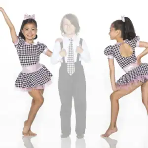 Young dancer modeling a houndstooth and pink costume