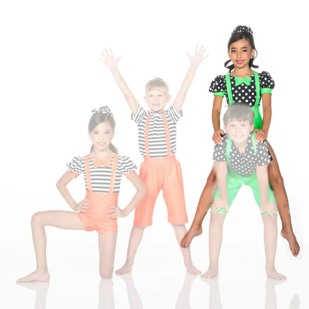 Four children in colorful polka-dot and striped costumes posing