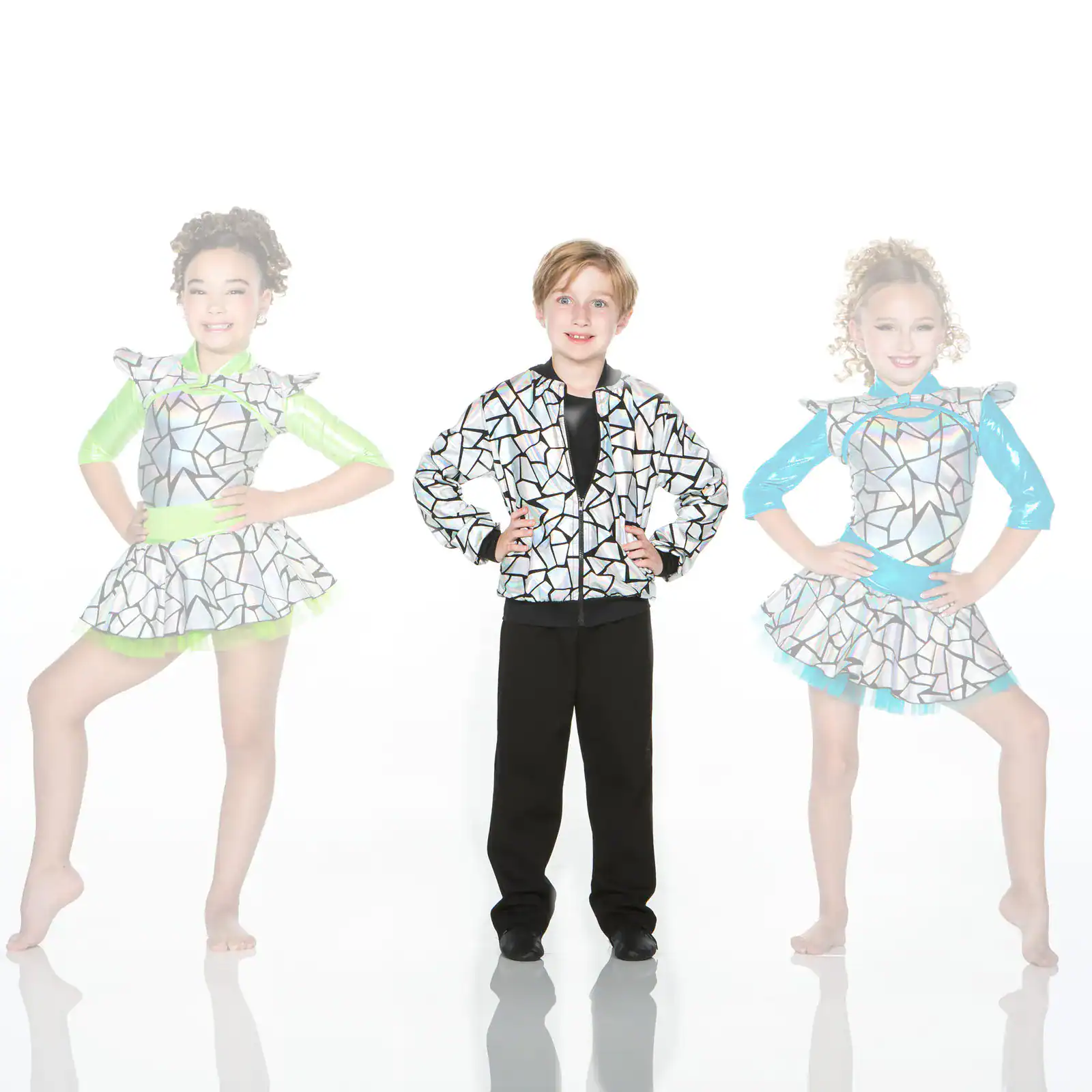 Three young dancers wearing silver mosaic-patterned costumes pose.