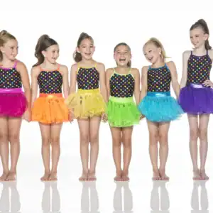 Six young dancers in colorful polka-dot costumes and tutus