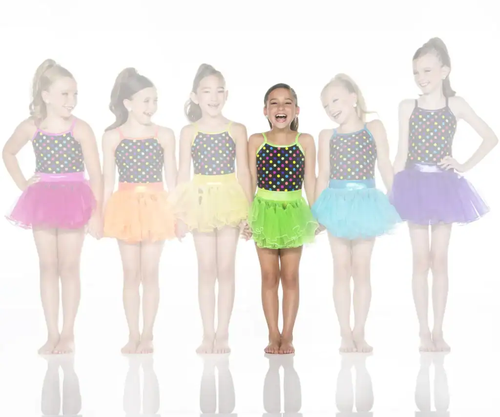 Six young dancers wearing colorful polka-dot leotards and tutus