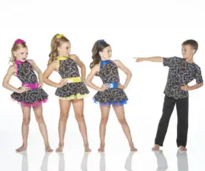 Four children wearing colorful patterned dance costumes