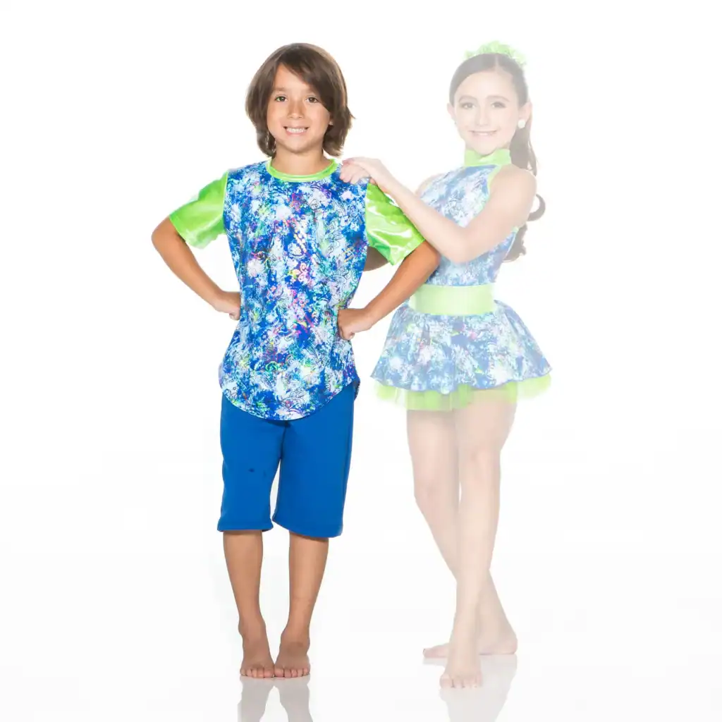 Two children wearing colorful blue and green performance costumes