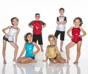 Six children pose in colorful dance costumes.