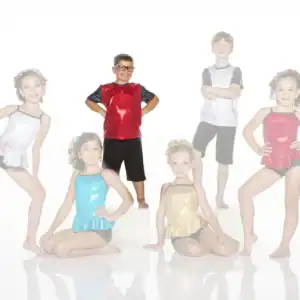 Six children posing in colorful dance costumes