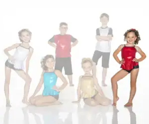 Six children pose in colorful dance costumes.