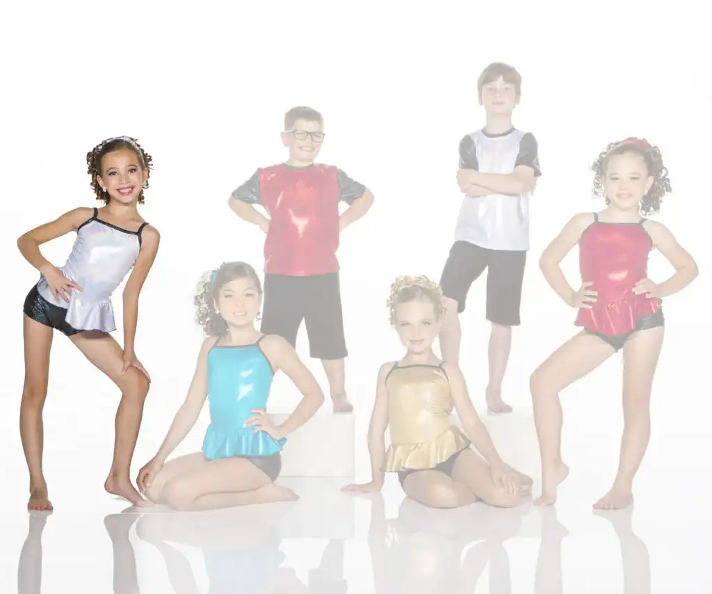 Six children pose in colorful dance costumes.