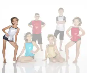 Six children pose in colorful dance costumes.