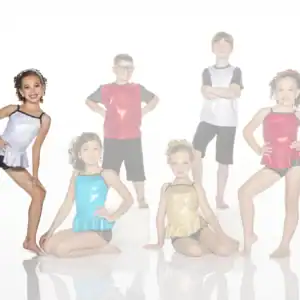 Six children pose in colorful dance costumes.
