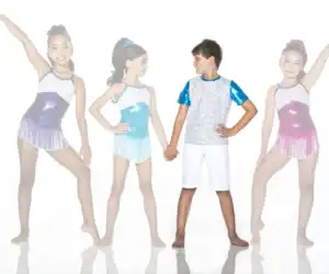 Four children wearing colorful dance costumes pose together.
