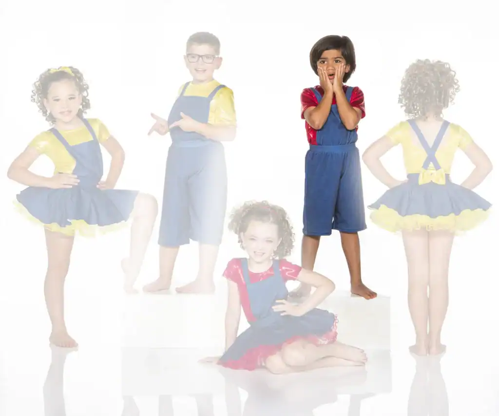 Children modeling colorful overalls and skirt costumes