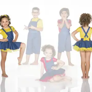 Children modeling colorful overalls and skirts against white background