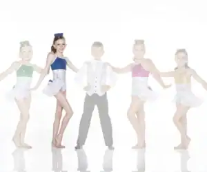 Five young dancers posing in colorful sequined costumes