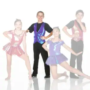 Four young dancers posing in colorful, shiny costumes