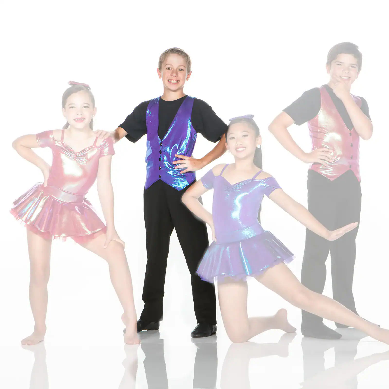 Four young dancers posing in colorful, shiny costumes