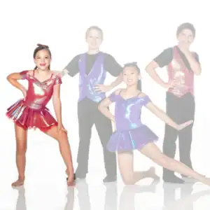 Four young dancers posing in colorful costumes
