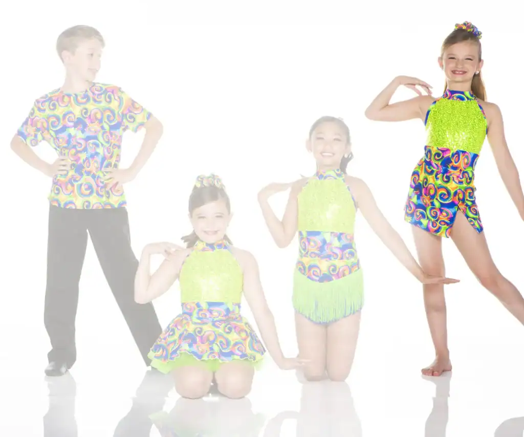 Four children pose in colorful dance costumes on white background.