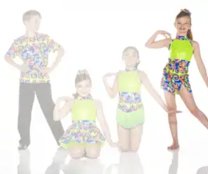 Four children pose in colorful dance costumes on white background.