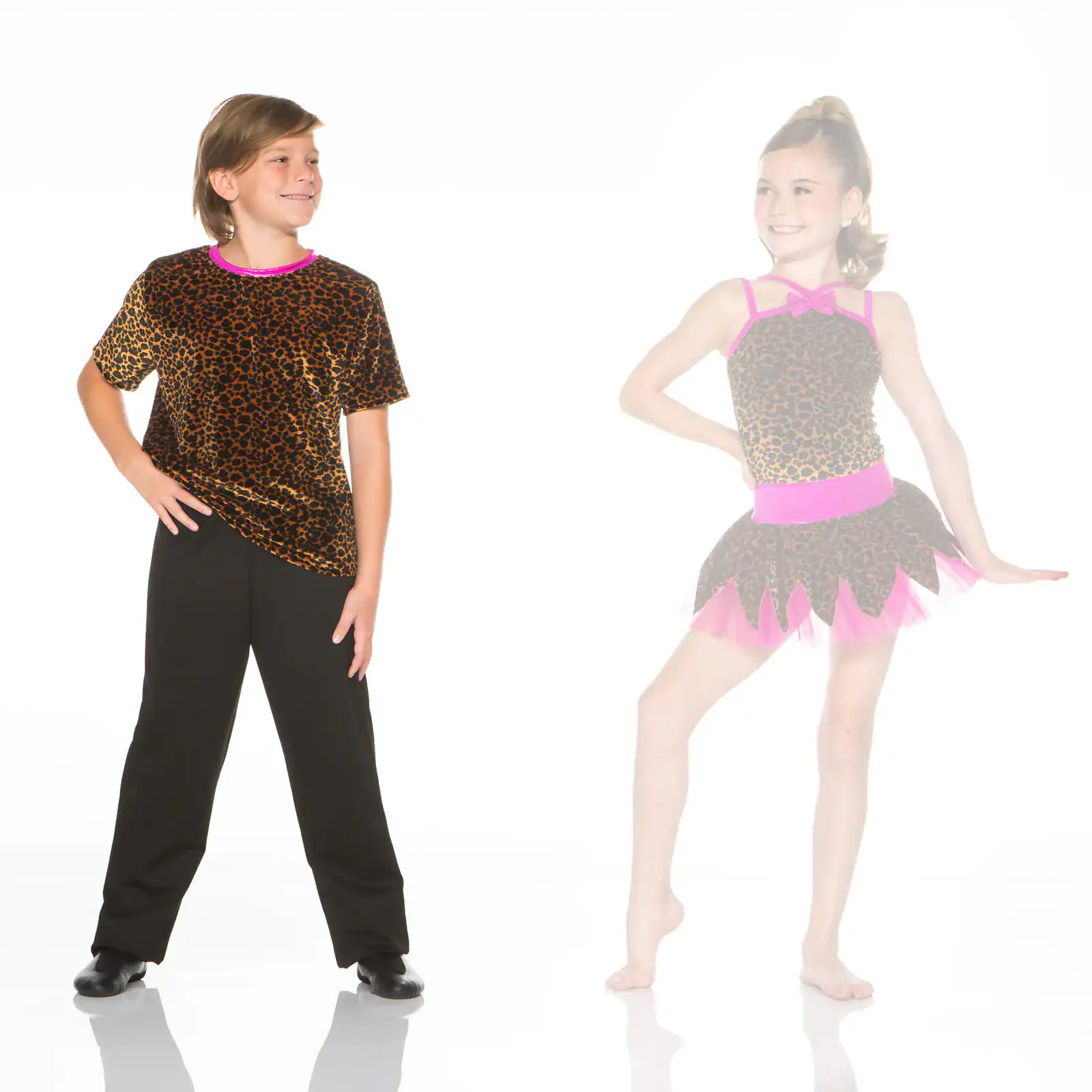 Two children model leopard-print dance costumes on white background.