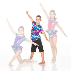 Three children posing in colorful dance costumes