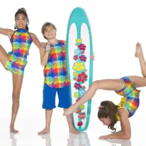 Three children in colorful outfits pose with floral surfboard.