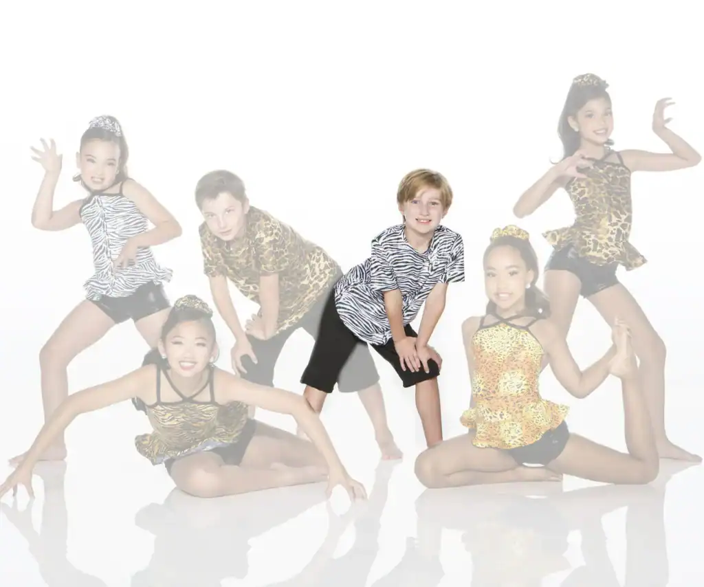 Five children posing in animal-print dance costumes