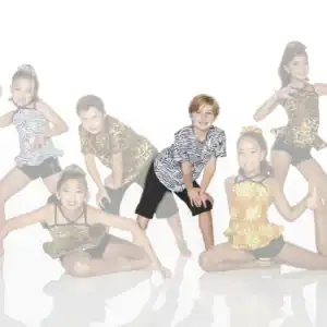 Six children pose in animal-print dance costumes.