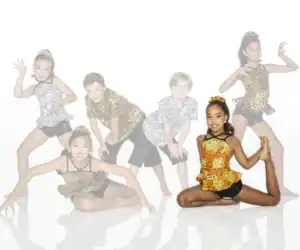 Young dancers pose in animal-print costumes