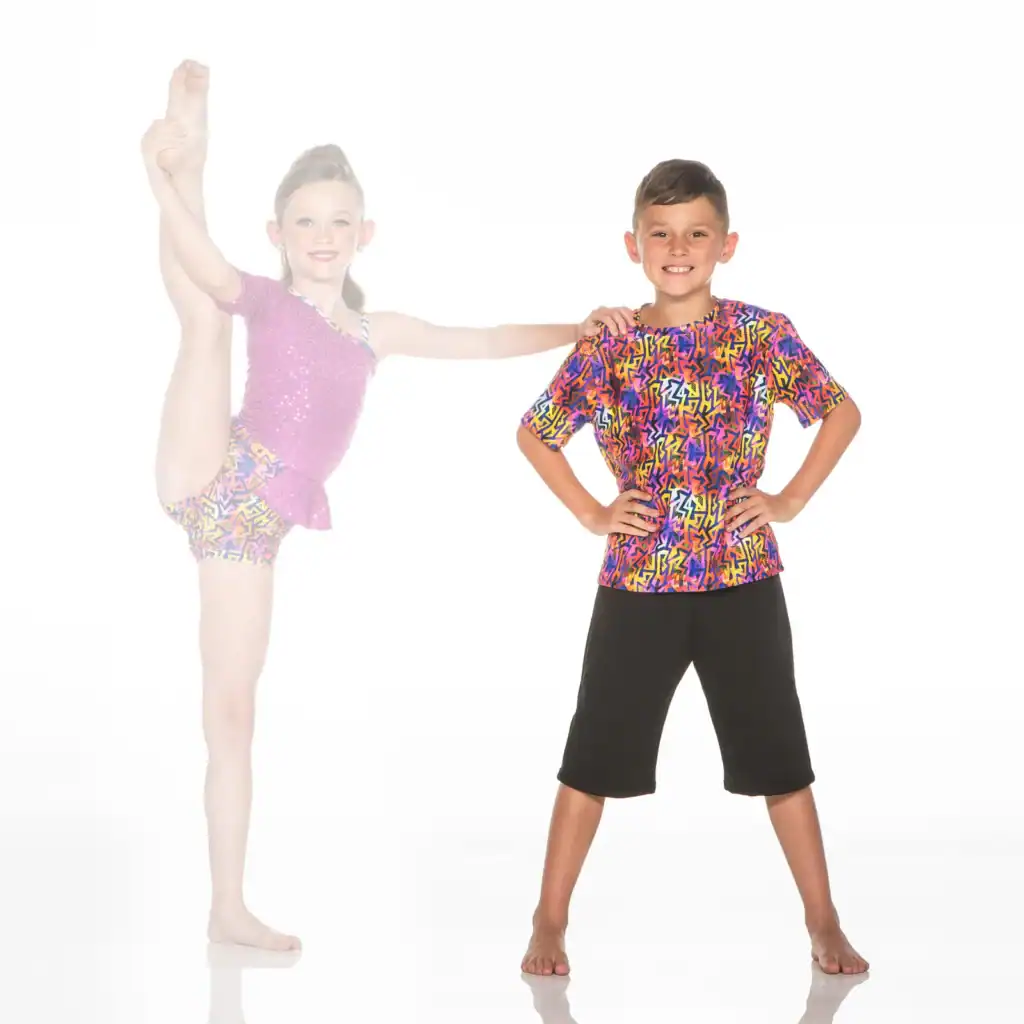 Young dancers in colorful outfits pose against white background.
